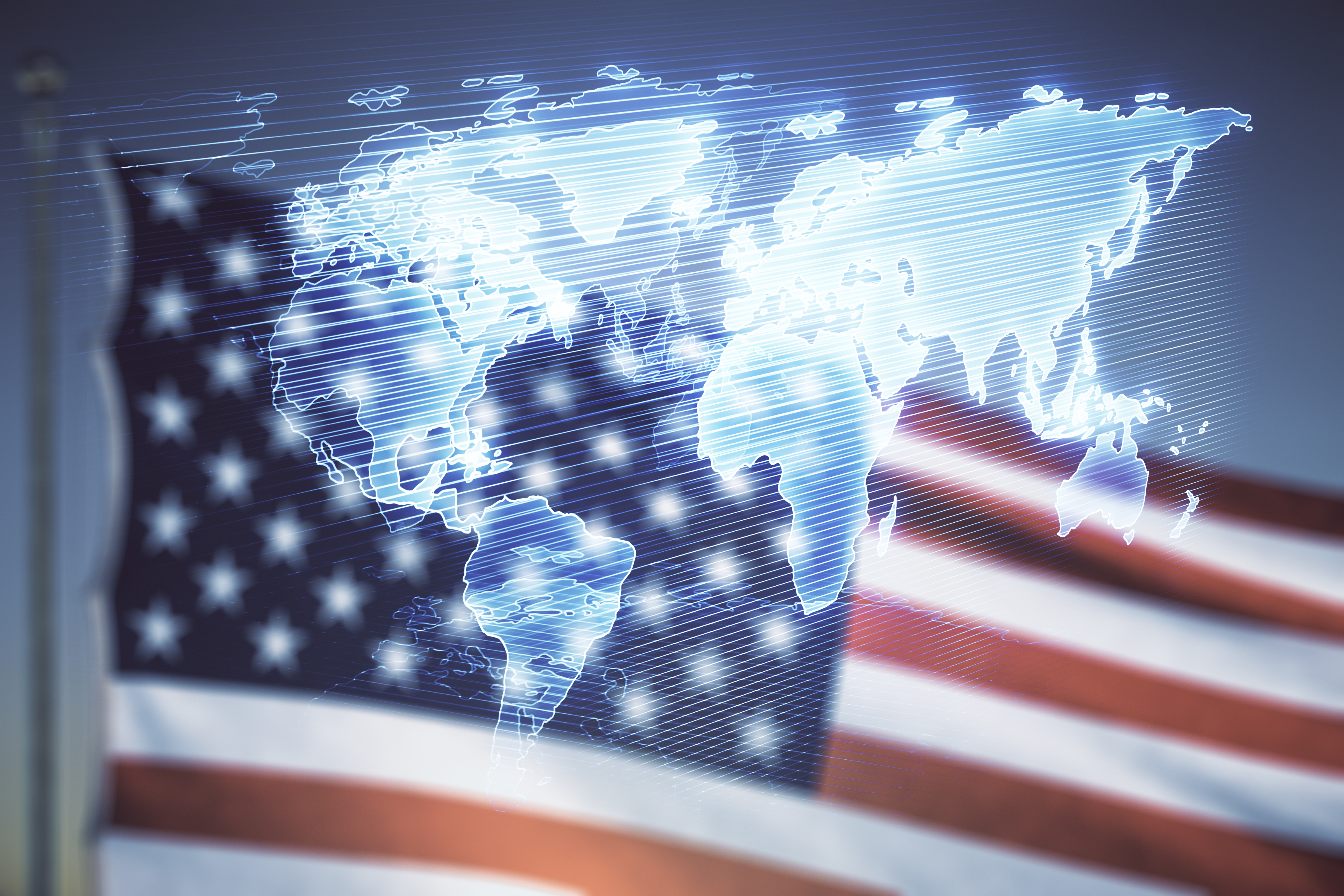 World map over a United States Flag