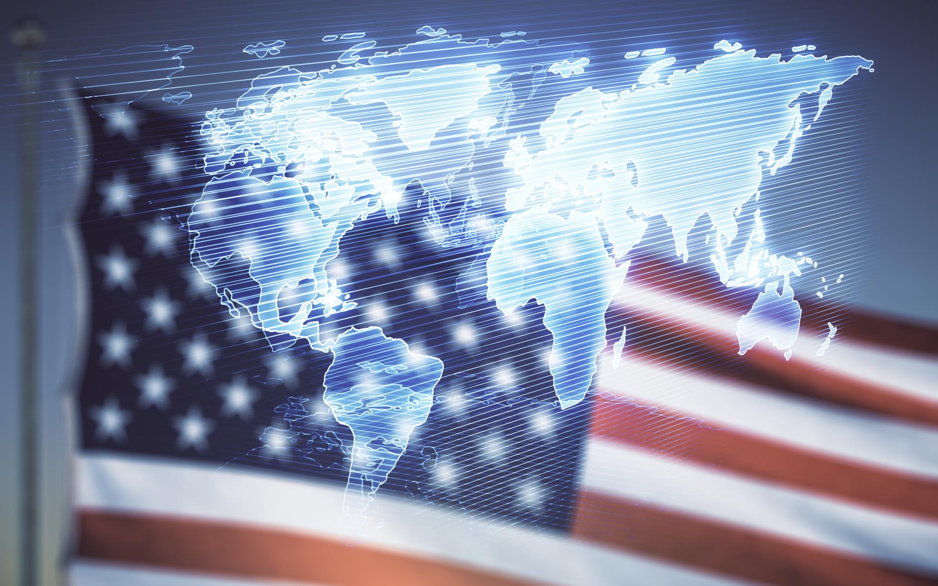 World map over a United States Flag